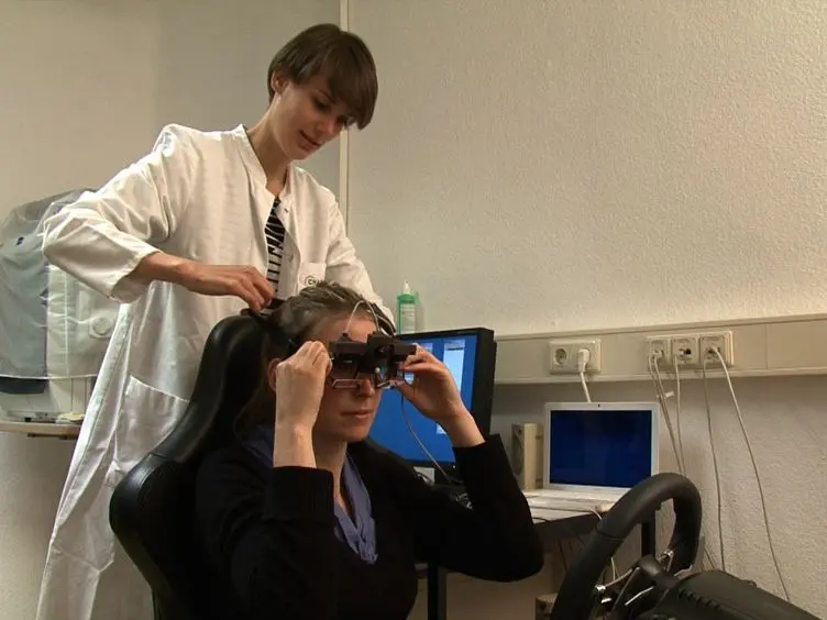 Driving Simulation in the Clinic: Testing Visual Exploratory Behavior in Daily Life Activities in Patients with Visual Field Defects